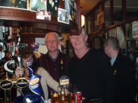 the smallest bar in england. it is only 3 ft. long. my brother and i are in fact standing behind it.