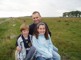 You can just see the ruin far away in the background. Kristian, Emma, and David in the foreground.