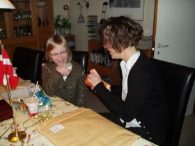 Cecilie and Birgitte unpacking presents.